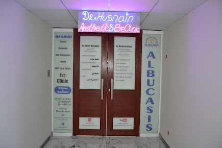 Main entrance doors and signage for Albucasis clinic